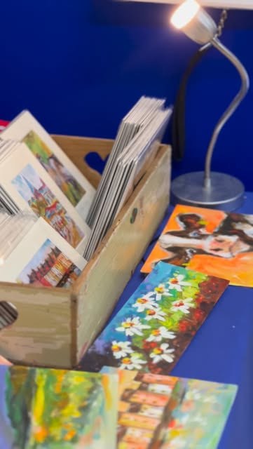 Prints and bookmarks on a stand at Barna Art Fair 2025